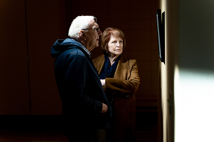 Couple looking at art