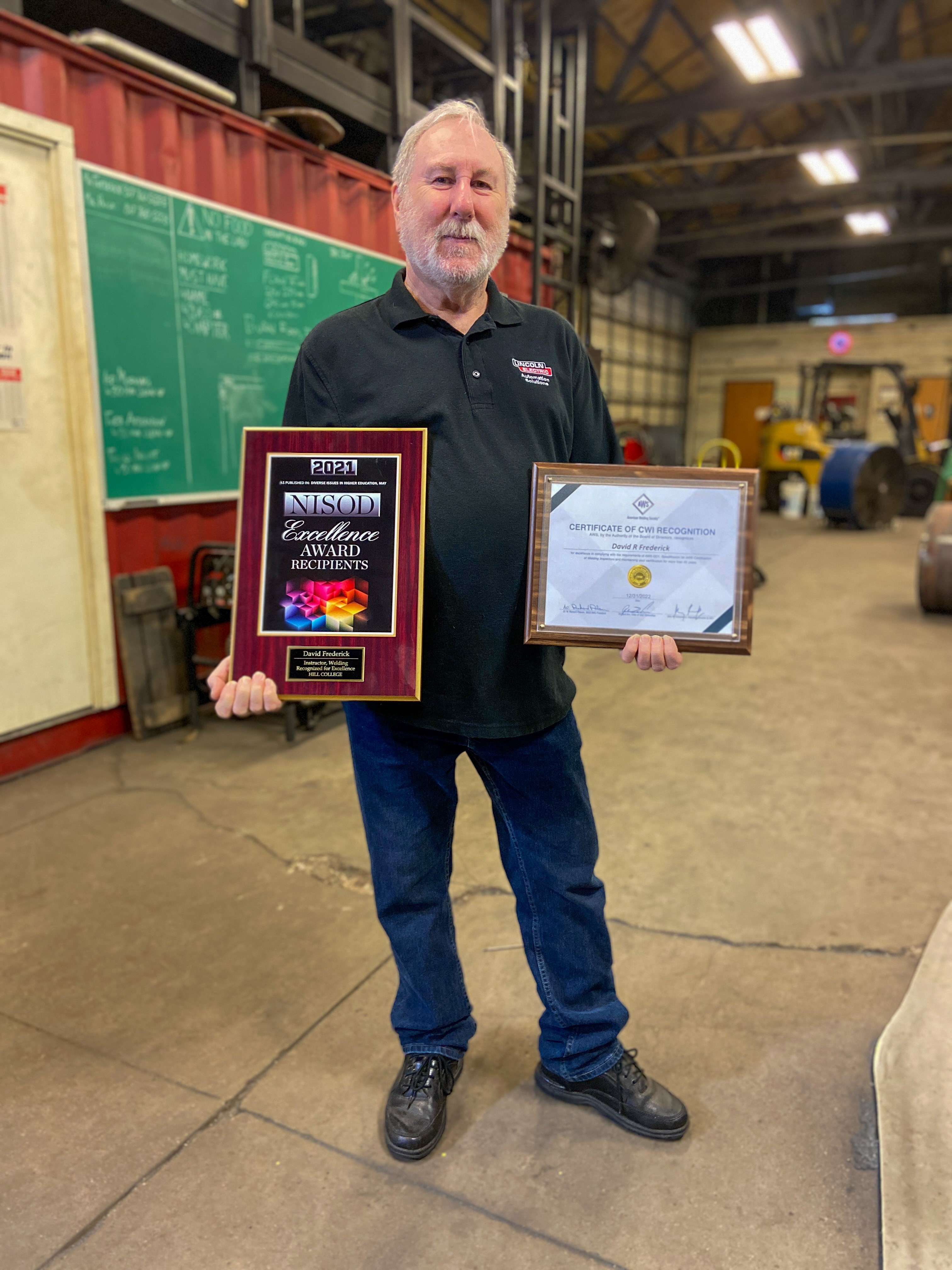 Hillsboro College's David Frederick holds awards