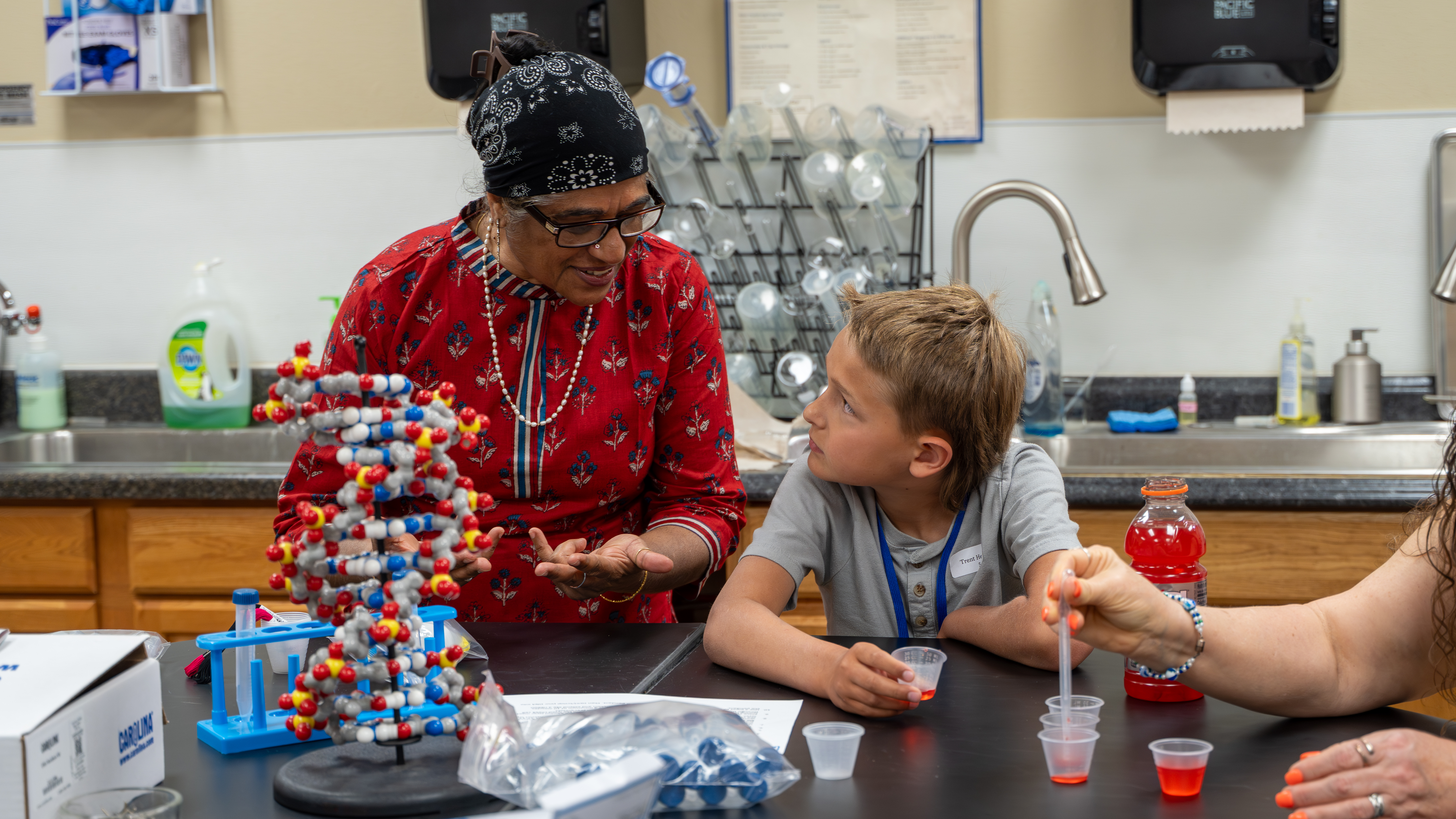 Instructor and student during Kids College
